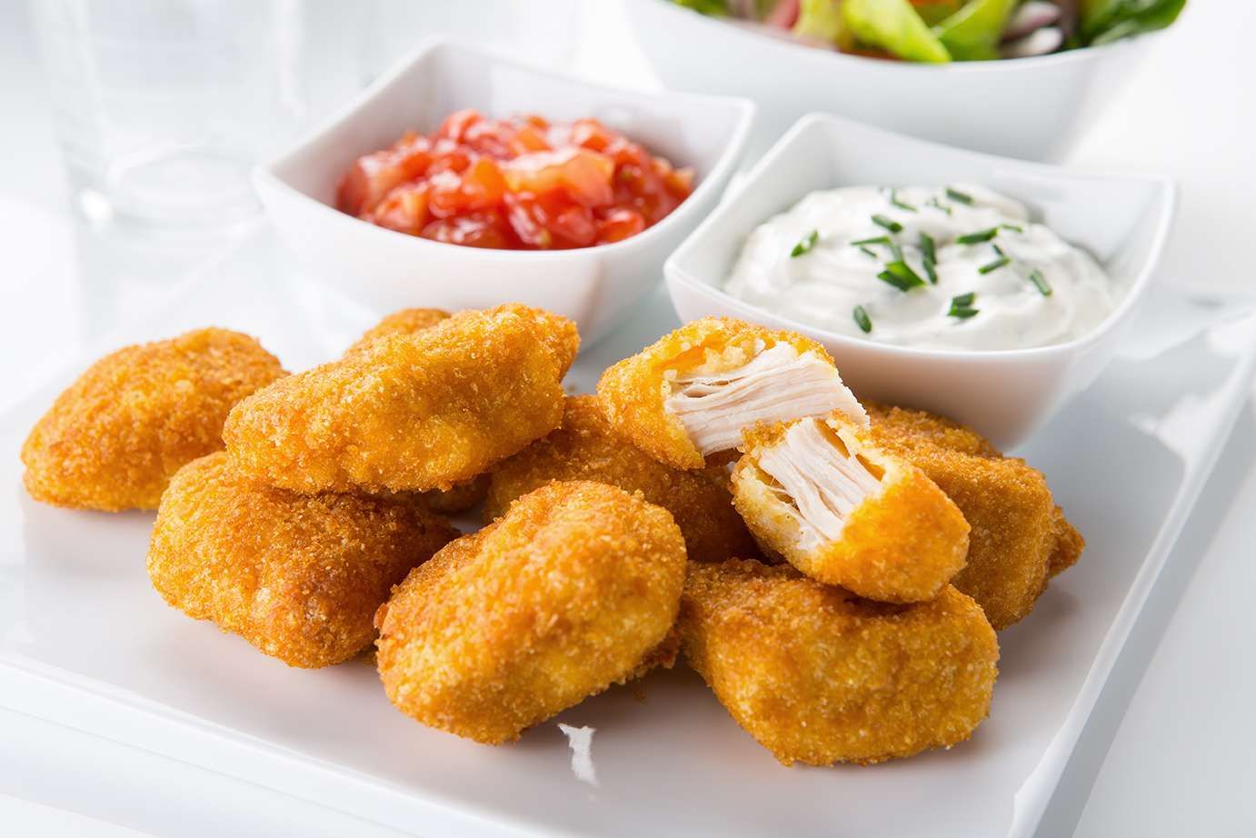 Nuggets de pollo 4 piezas con salsa