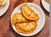 Empanadas pollo, doble queso Gouda